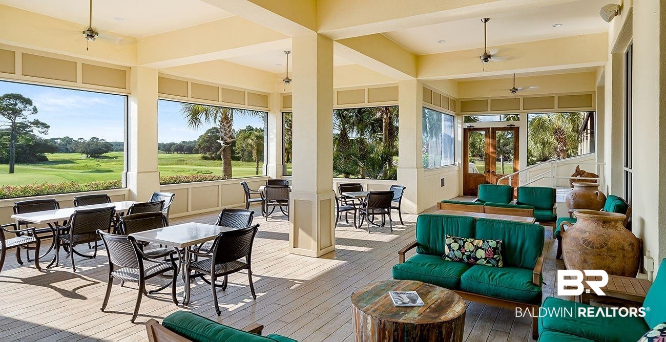815 Plantation Road, Unit 405 Gulf Shores, AL 36542 - Photo 36 of 39 Sunroom / solarium featuring ceiling fan and a healthy amount of sunlight