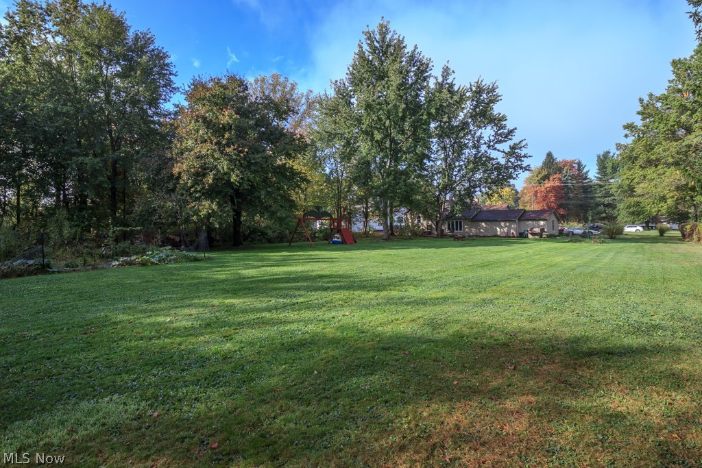 An abundance of green space on your very own acre lot 
