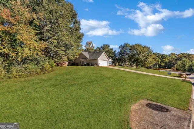a view of a golf course with a garden