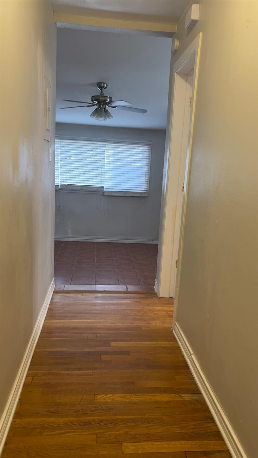 2714 29th Street Lubbock, TX 79410 - Photo 10 of 20 a view of room with wooden floor