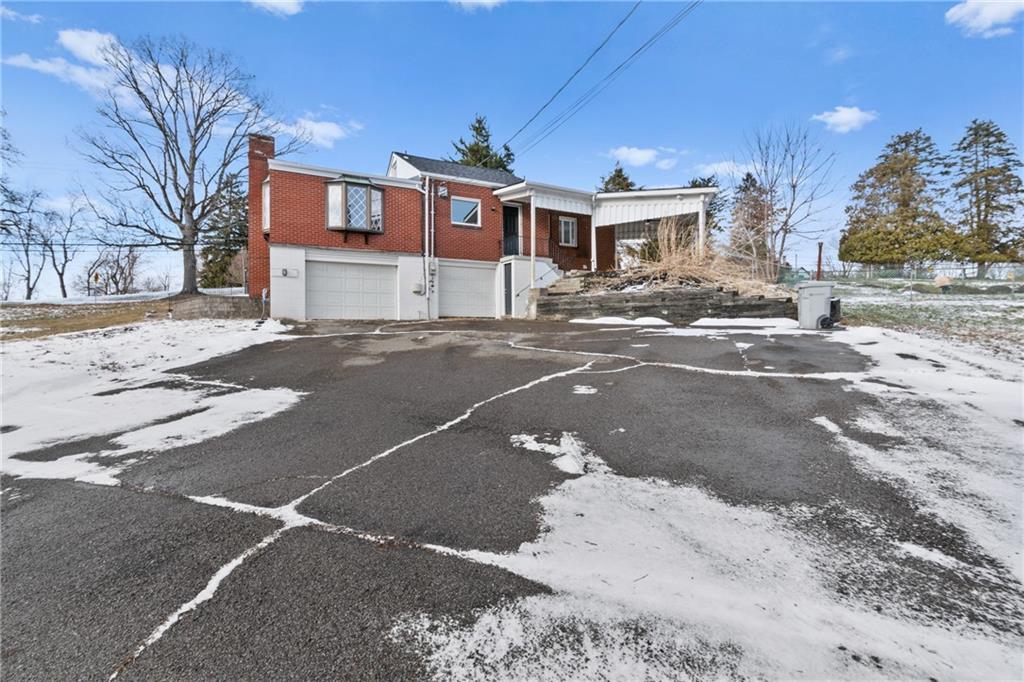 1200 Burchfield Road Allison Park, PA 15101 - Photo 18 of 19 a front view of a building with a road