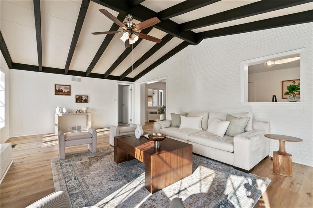 1200 Burchfield Road Allison Park, PA 15101 - Photo 6 of 19 a living room with furniture and a chandelier