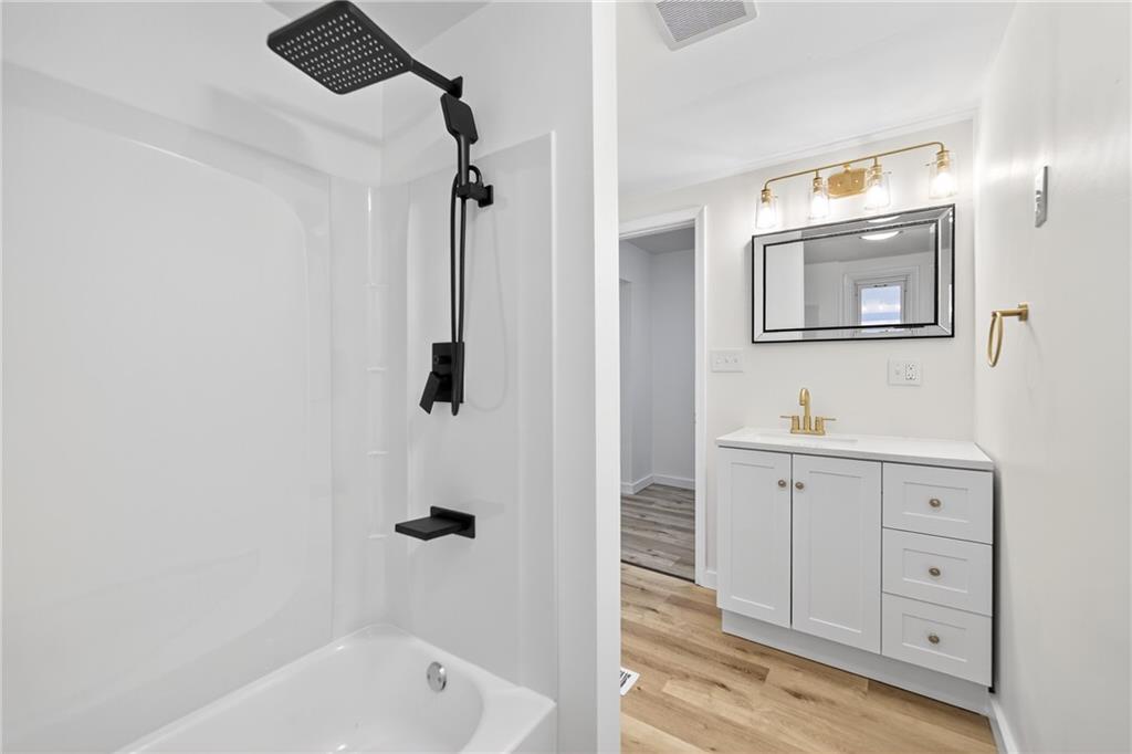 1200 Burchfield Road Allison Park, PA 15101 - Photo 8 of 19 a bathroom with a tub sink and mirror