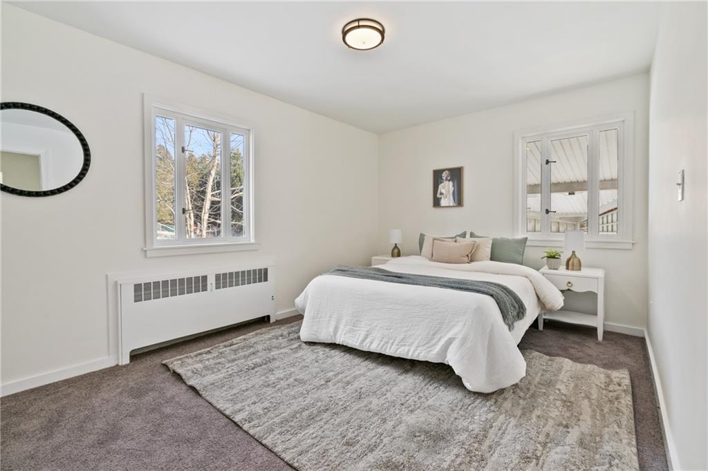 1200 Burchfield Road Allison Park, PA 15101 - Photo 10 of 19 a bedroom with a bed and a window