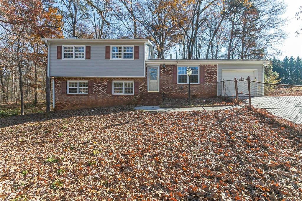 4243 Inca Court Douglasville, GA 30135 - Photo 1 of 1 front view of a house with a yard