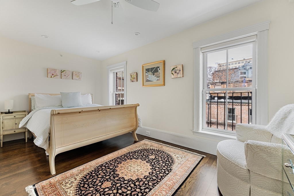 109 Appleton Street Boston, MA 02116 - Photo 17 of 26 a bedroom with a bed and a couch