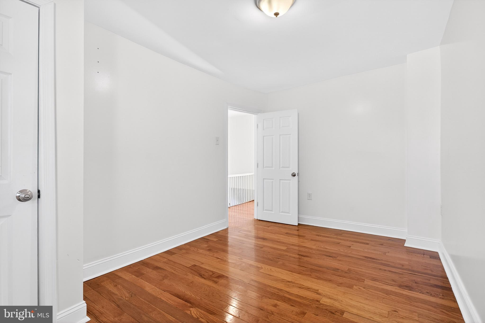 5119 Sheldon Street Philadelphia, PA 19144 - Photo 16 of 27 an empty room with wooden floor