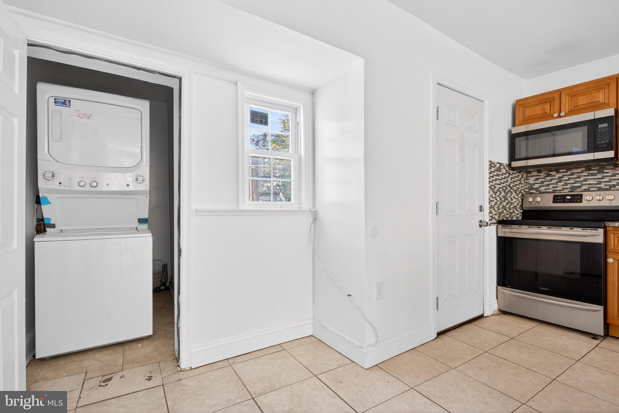 5119 Sheldon Street Philadelphia, PA 19144 - Photo 10 of 27 a view of kitchen and utility room