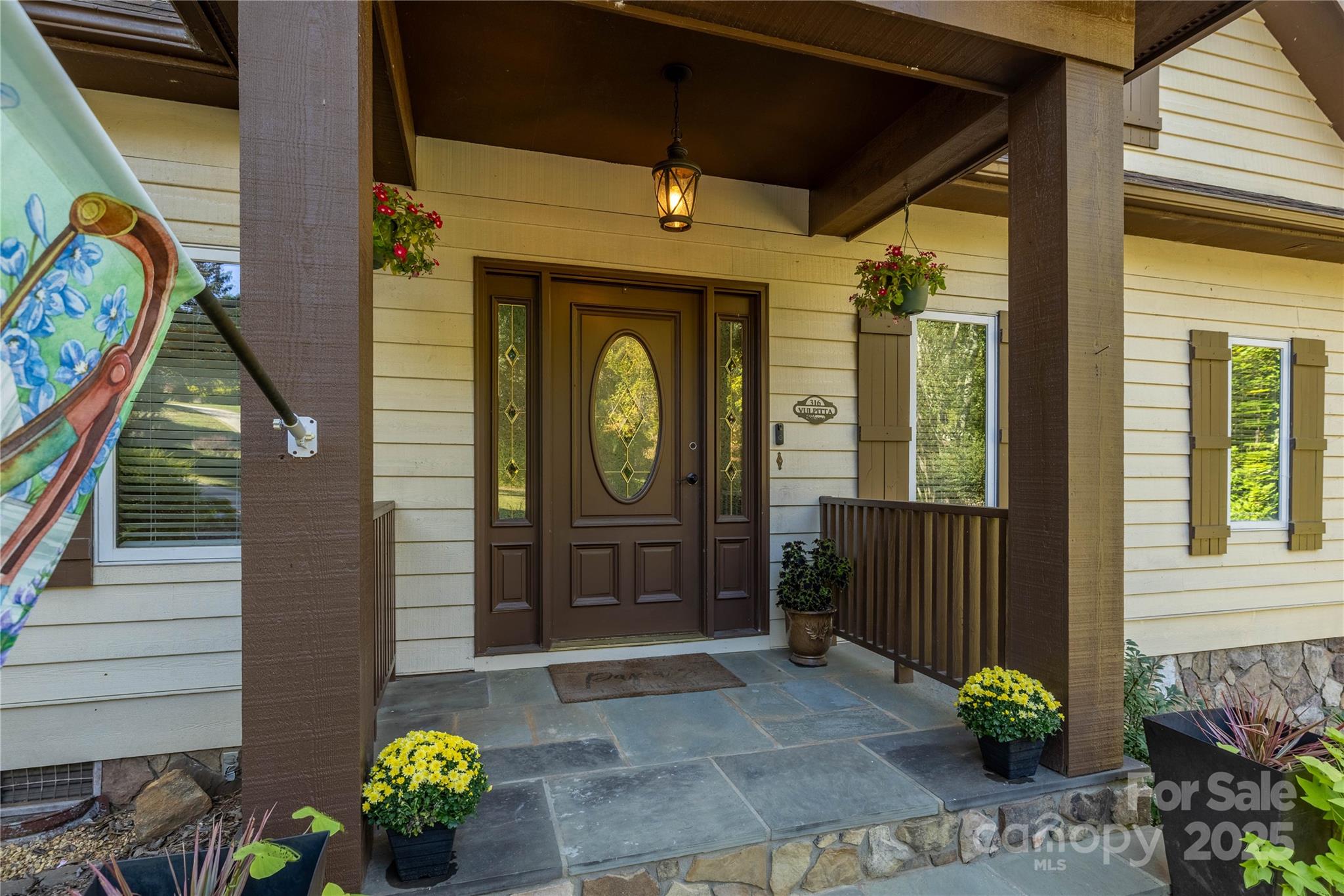 316 Players Ridge Road Hickory, NC 28601 - Photo 14 of 47 a front view of a house with outdoor seating