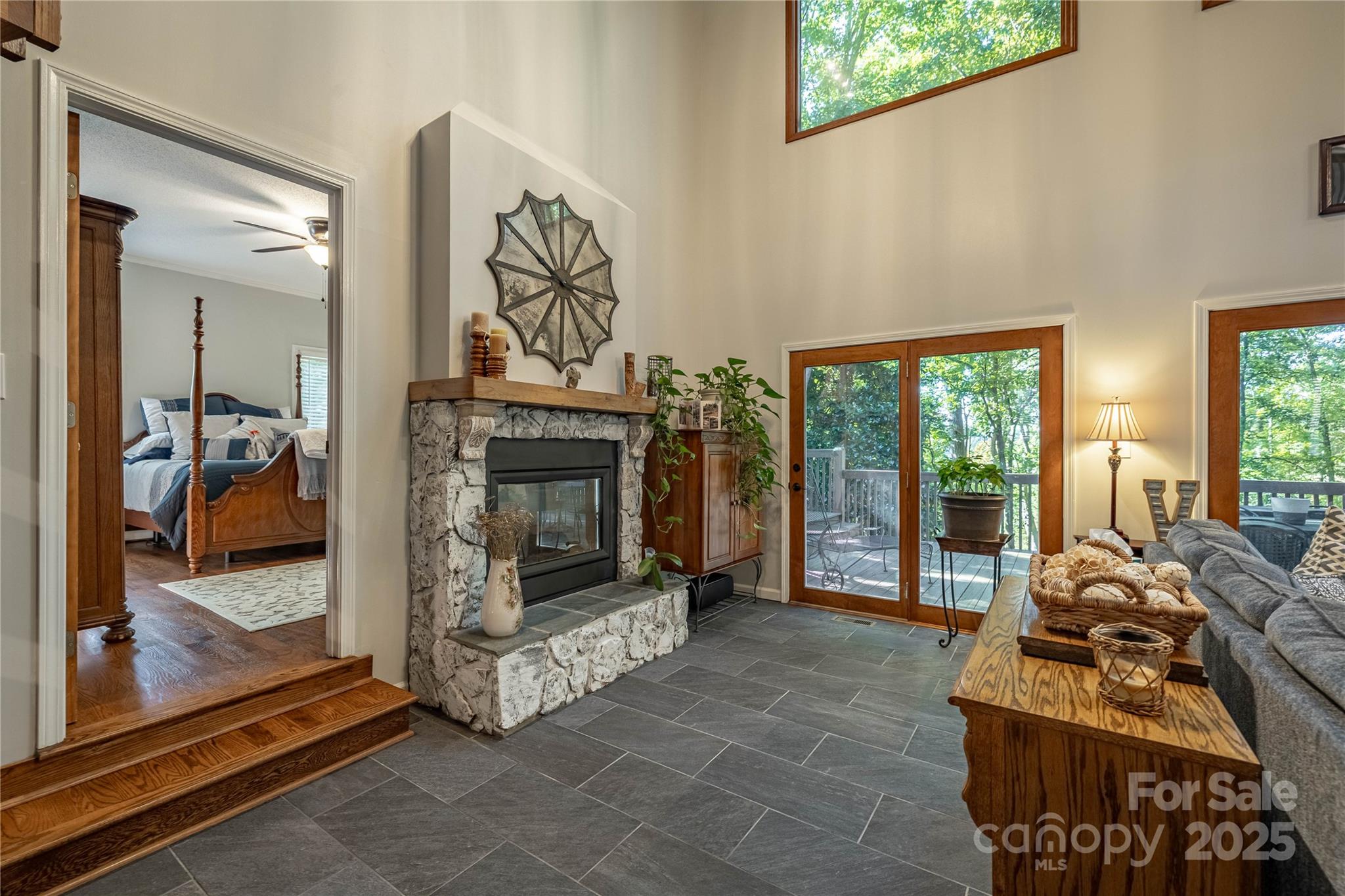 316 Players Ridge Road Hickory, NC 28601 - Photo 20 of 47 a living room with furniture a flat screen tv and a fireplace