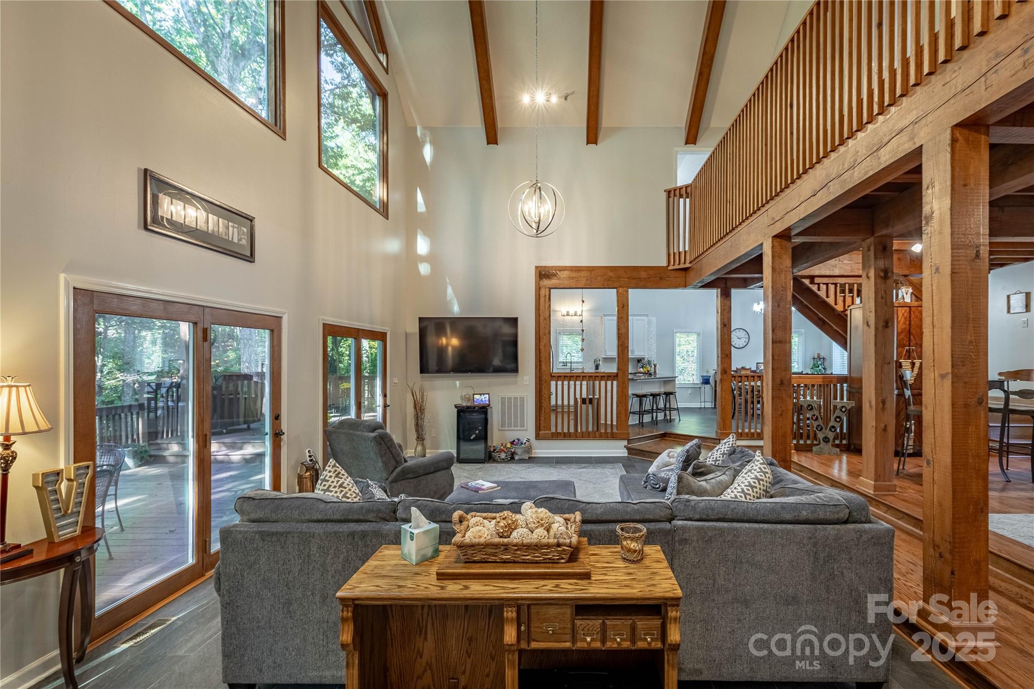 316 Players Ridge Road Hickory, NC 28601 - Photo 21 of 47 a living room with furniture and a floor to ceiling window