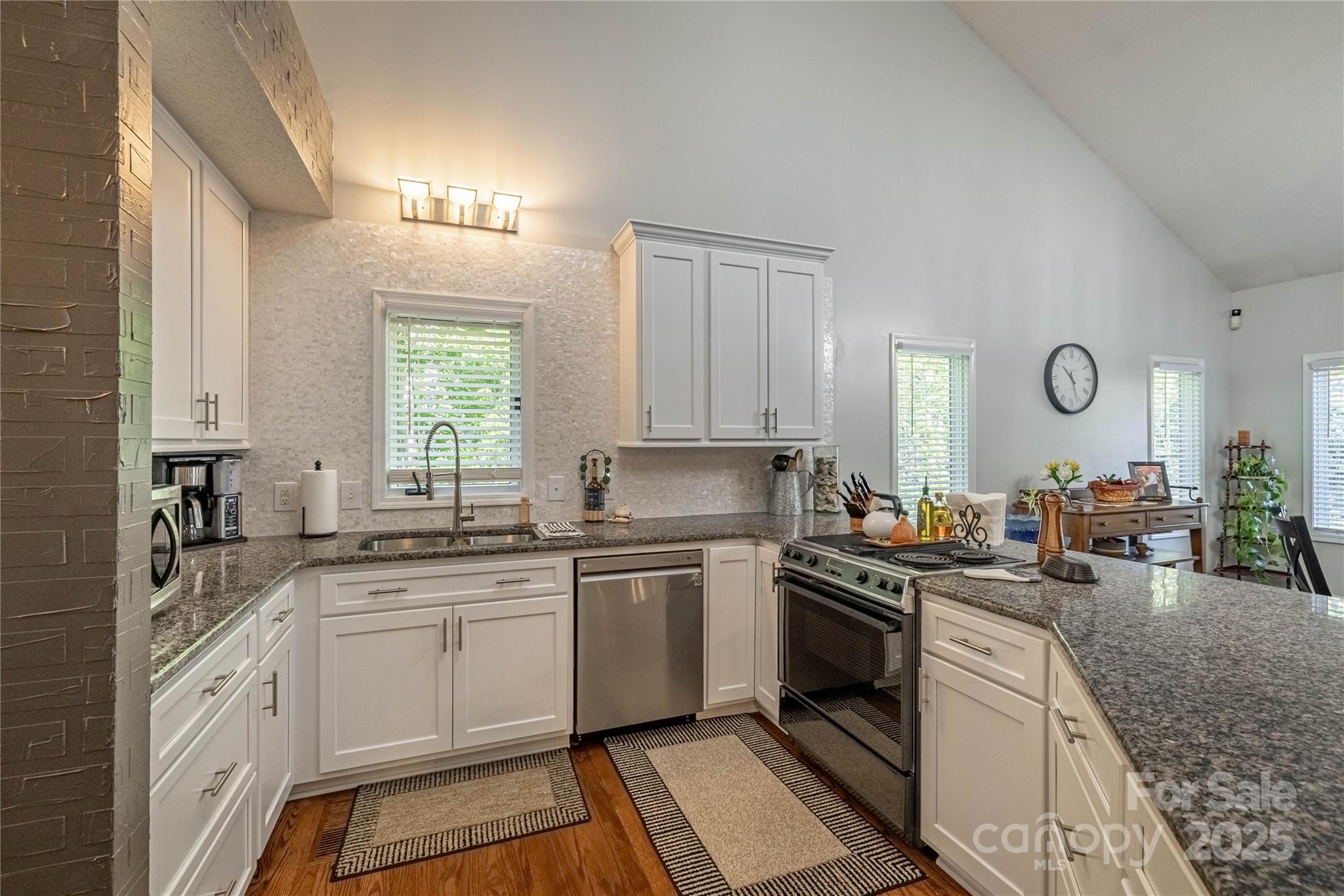 316 Players Ridge Road Hickory, NC 28601 - Photo 23 of 47 a kitchen with a sink stove and cabinets