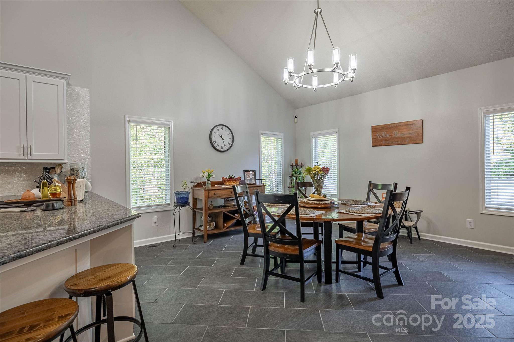 316 Players Ridge Road Hickory, NC 28601 - Photo 24 of 47 a view of a dining room with furniture and chandelier