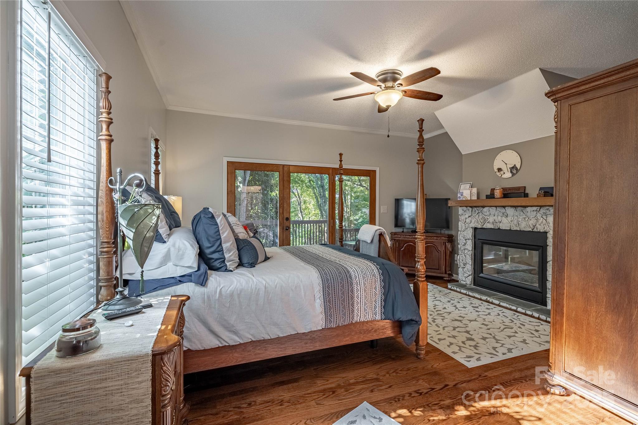 316 Players Ridge Road Hickory, NC 28601 - Photo 29 of 47 a bed room with a bed and a fireplace