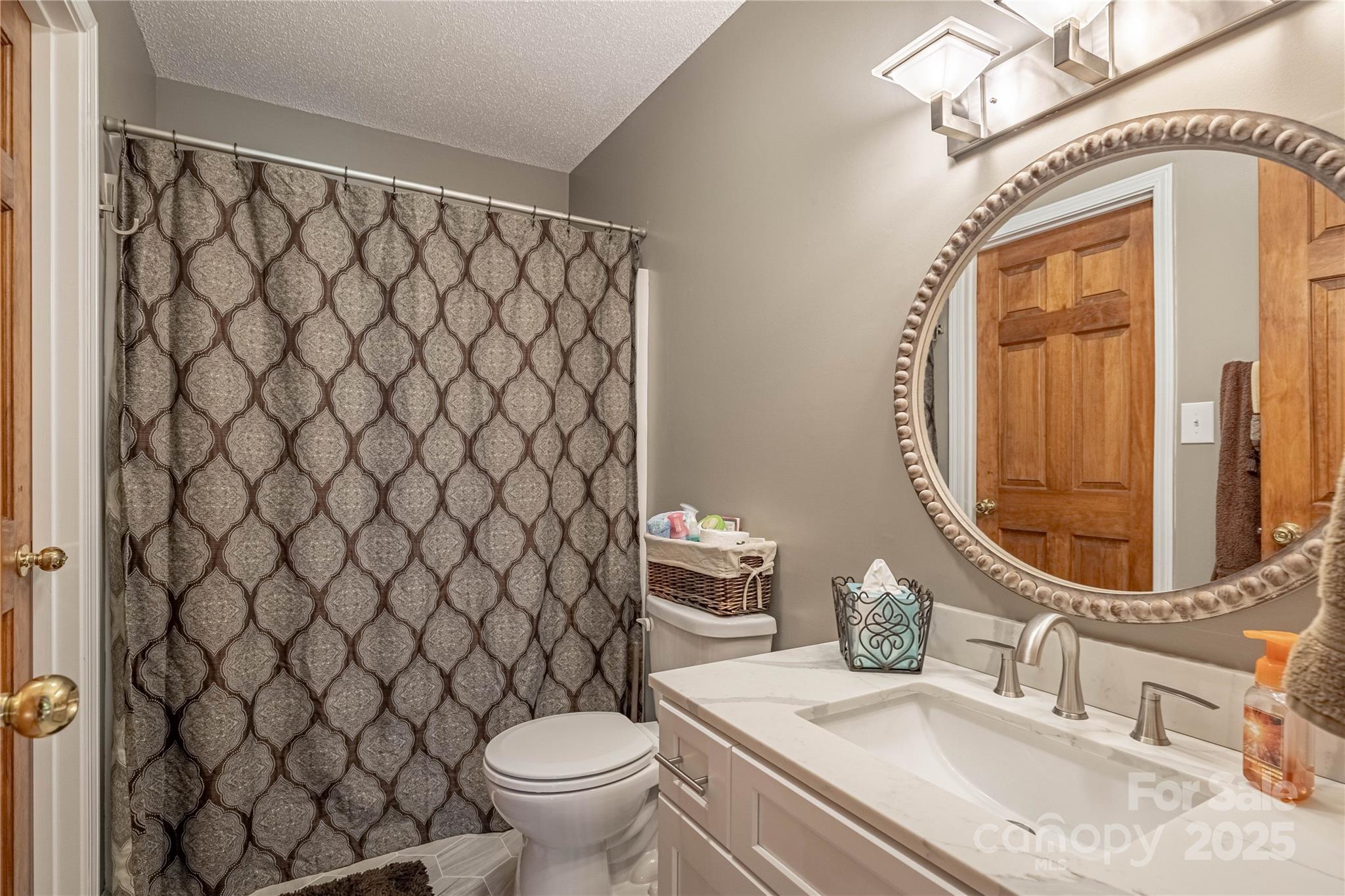 316 Players Ridge Road Hickory, NC 28601 - Photo 35 of 47 a bathroom with a sink and a mirror