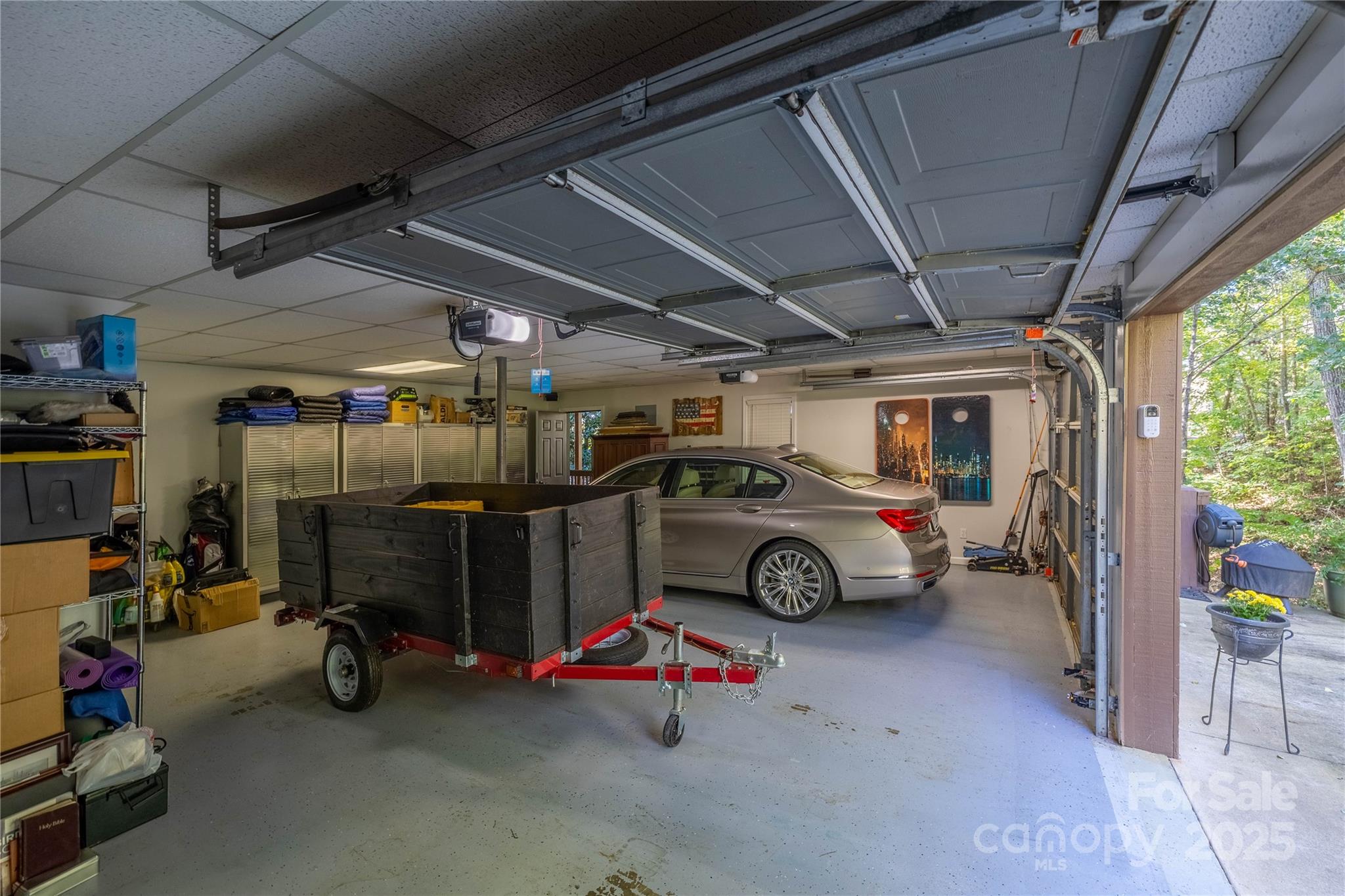 316 Players Ridge Road Hickory, NC 28601 - Photo 39 of 47 a view of parking garage with cars and other equipment