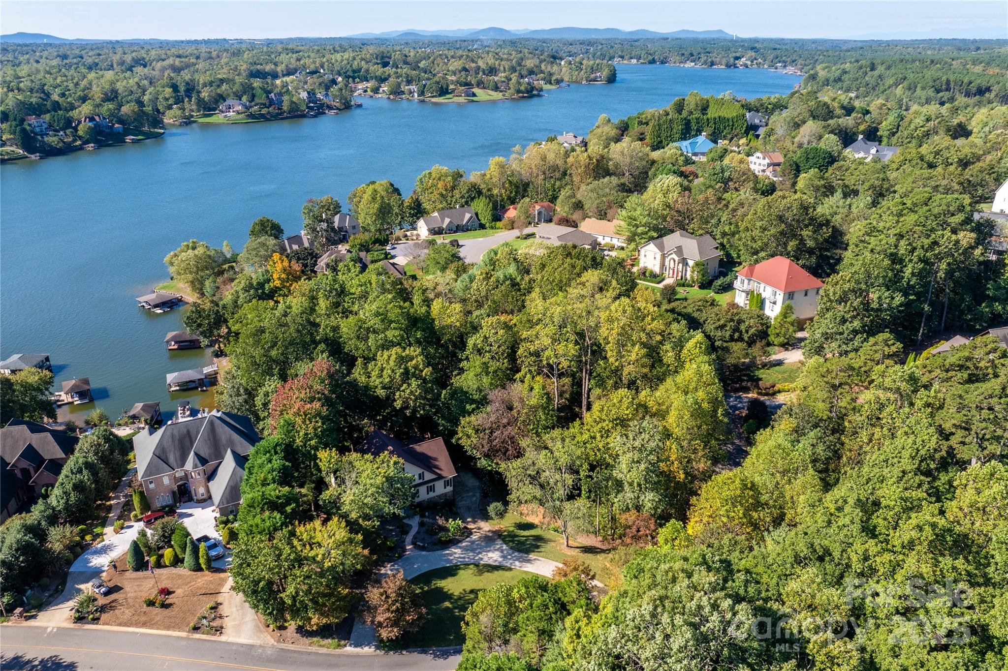 316 Players Ridge Road Hickory, NC 28601 - Photo 8 of 47 a view of a lake with mountains in the background