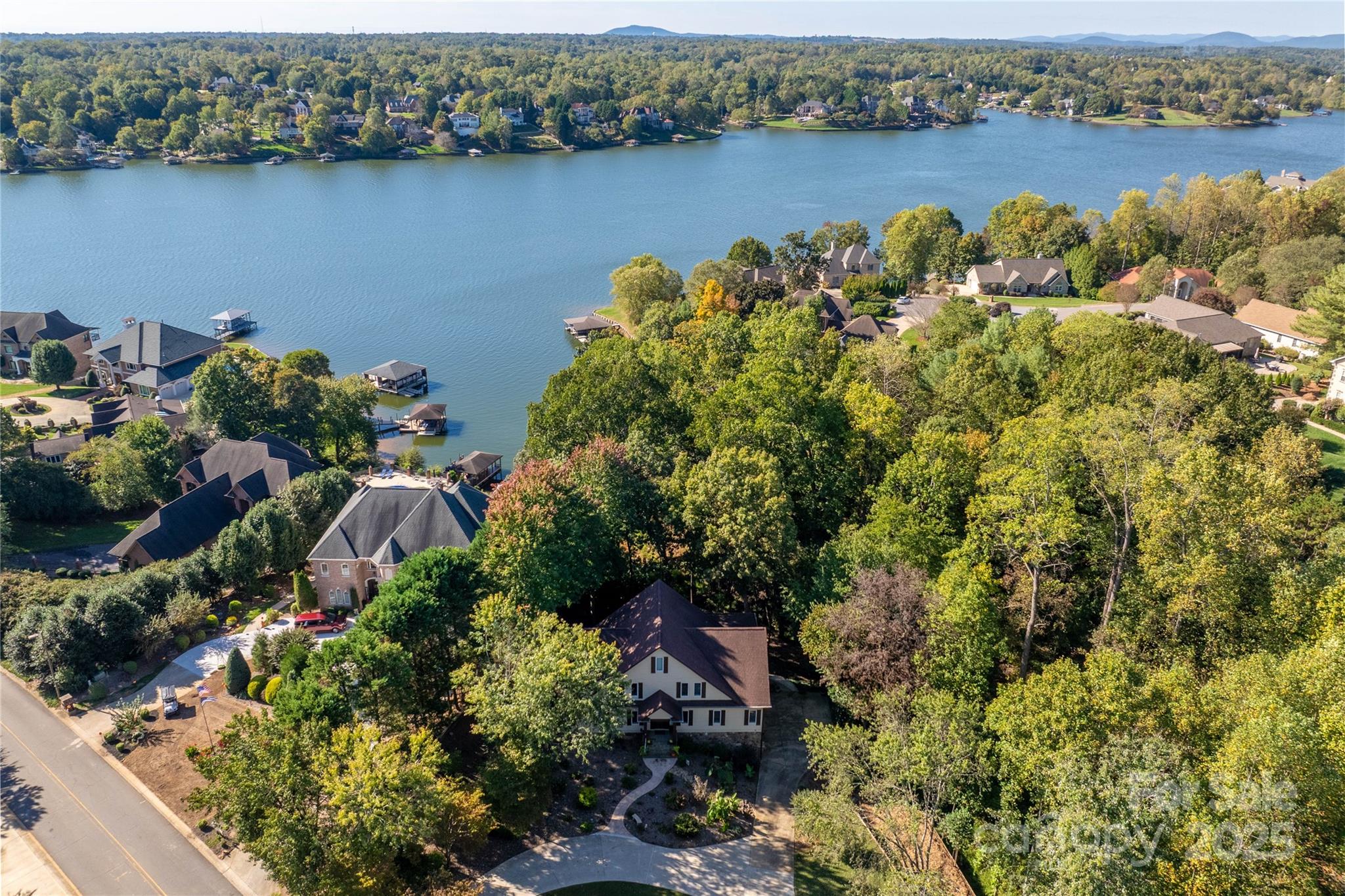 316 Players Ridge Road Hickory, NC 28601 - Photo 10 of 47 an aerial view of a houses with a lake view