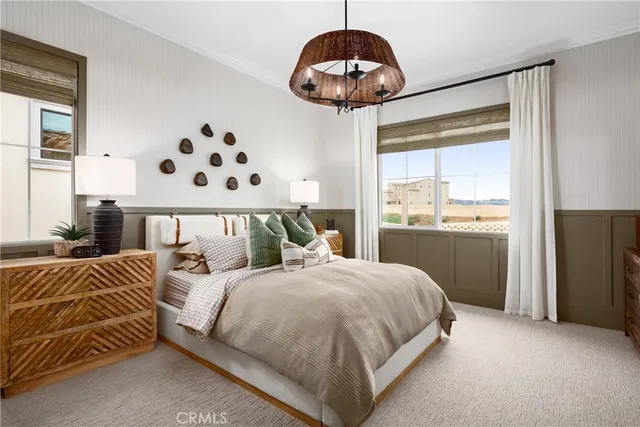 a bedroom with bed and window