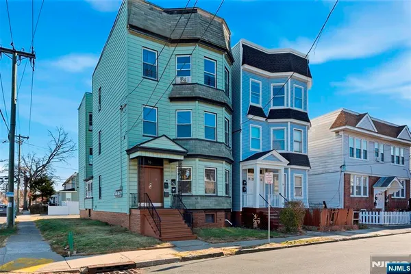 a front view of a multi story building