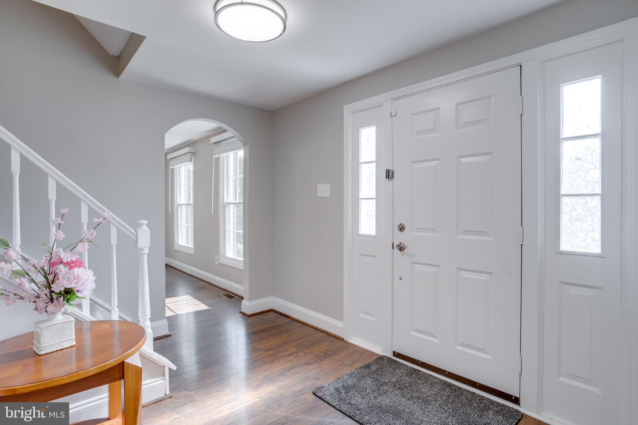7114 Sterling Grove Drive Springfield, VA 22150 - Photo 11 of 55 a view of entryway with wooden floor