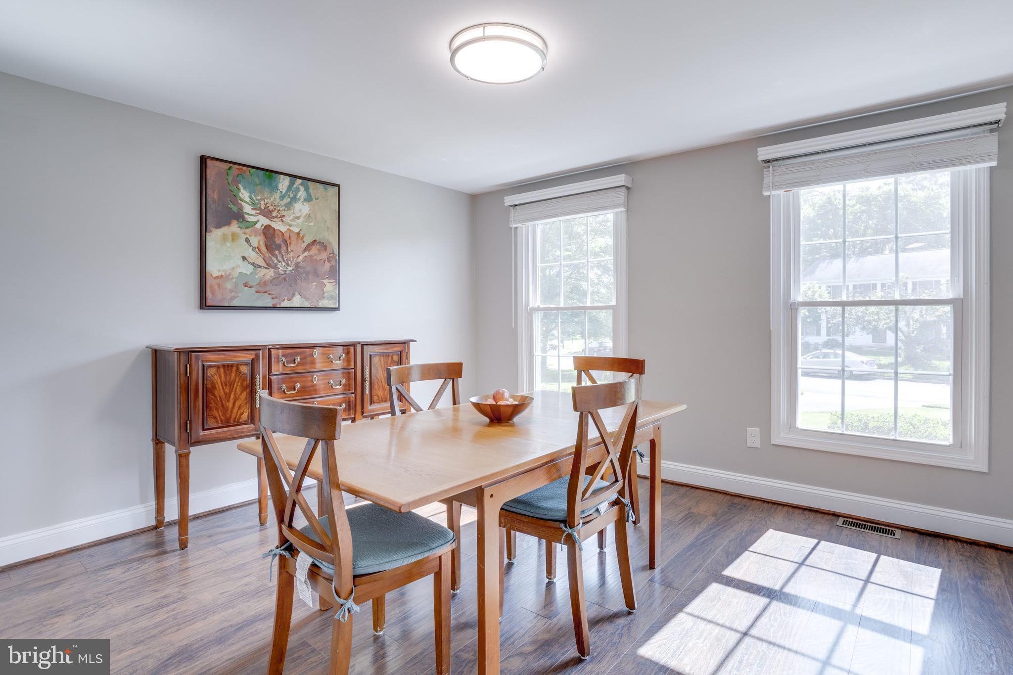 7114 Sterling Grove Drive Springfield, VA 22150 - Photo 23 of 55 a view of a dining room with furniture and window