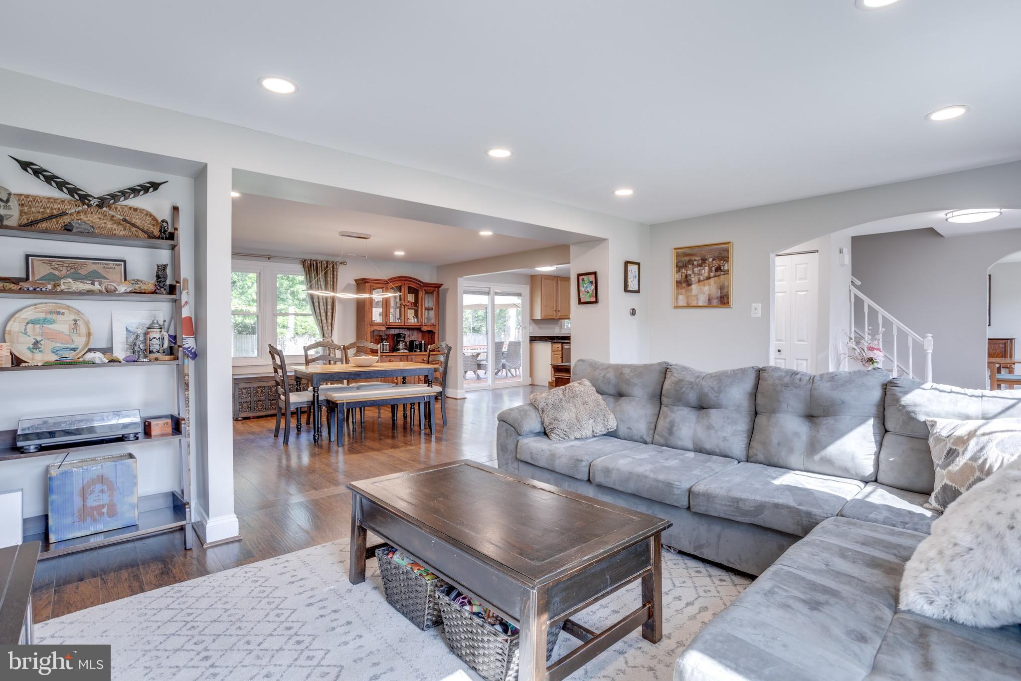 7114 Sterling Grove Drive Springfield, VA 22150 - Photo 3 of 55 a living room with furniture and a table