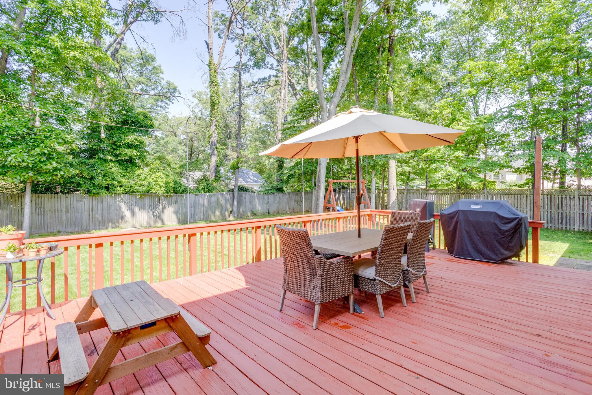 7114 Sterling Grove Drive Springfield, VA 22150 - Photo 44 of 55 a view of a chairs and table on the wooden floor