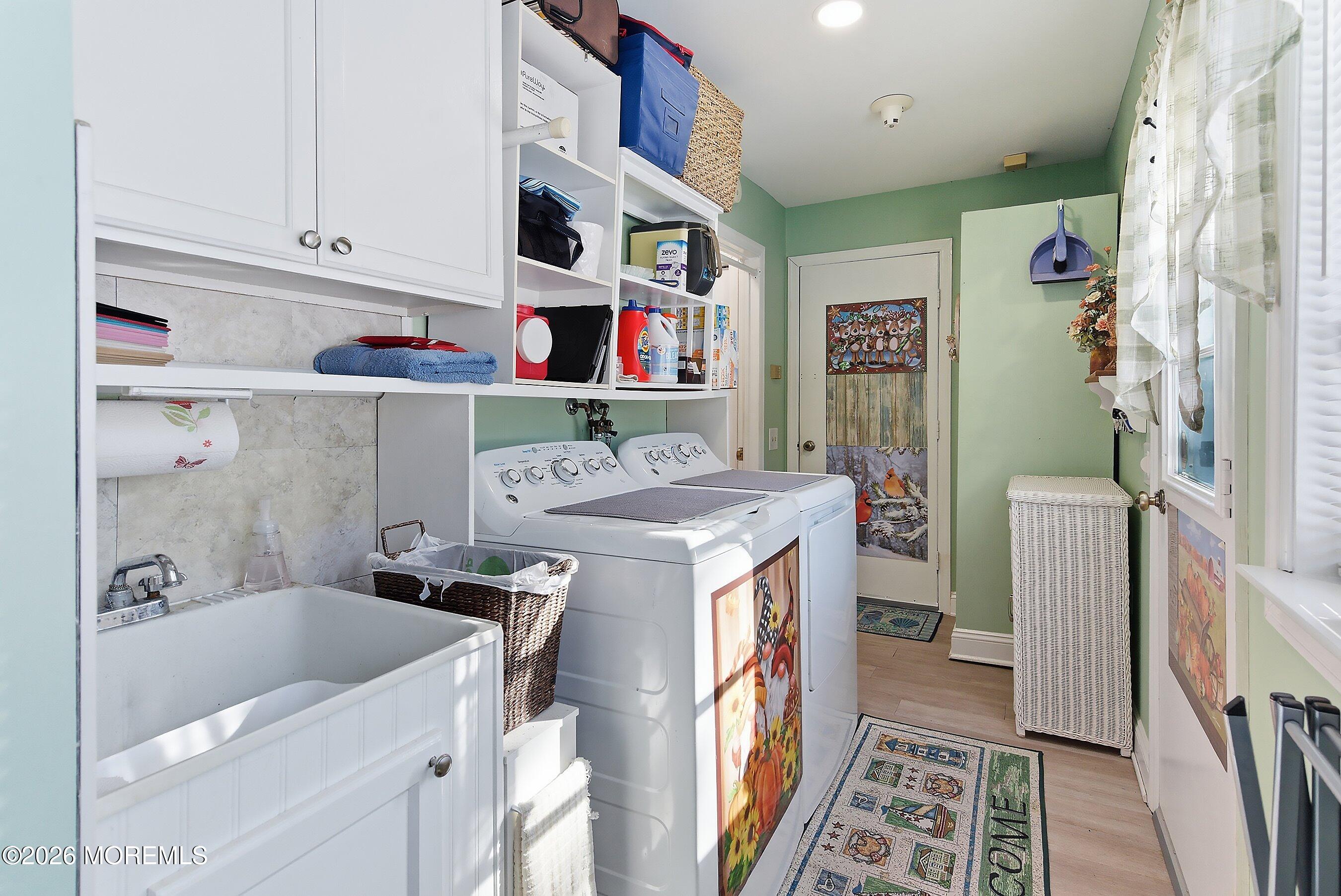 27 Amesbury Road, Unit 64 Whiting, NJ 08759 - Photo 24 of 50 a utility room with a washer and dryer