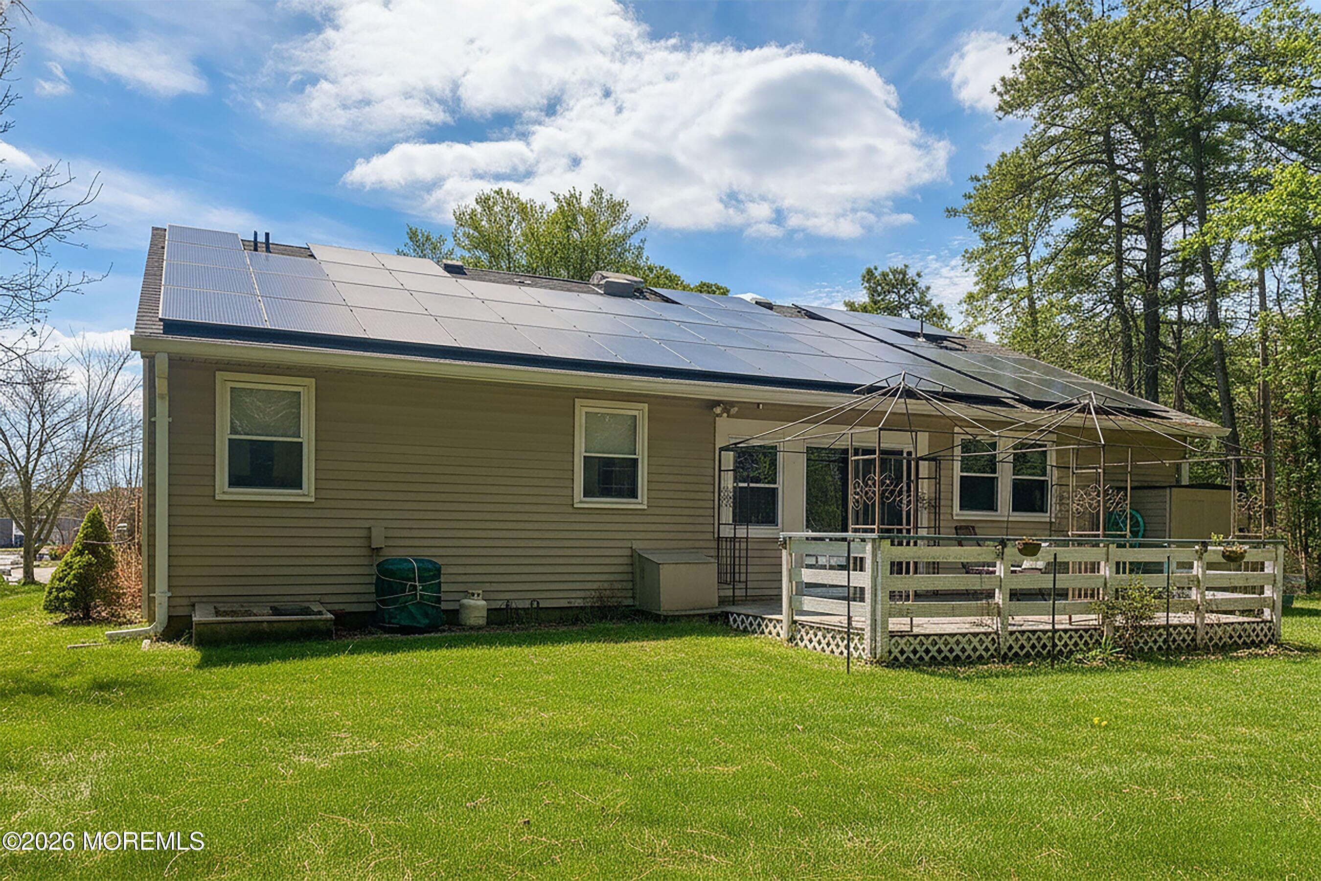 27 Amesbury Road, Unit 64 Whiting, NJ 08759 - Photo 41 of 50 a front view of a house with a garden