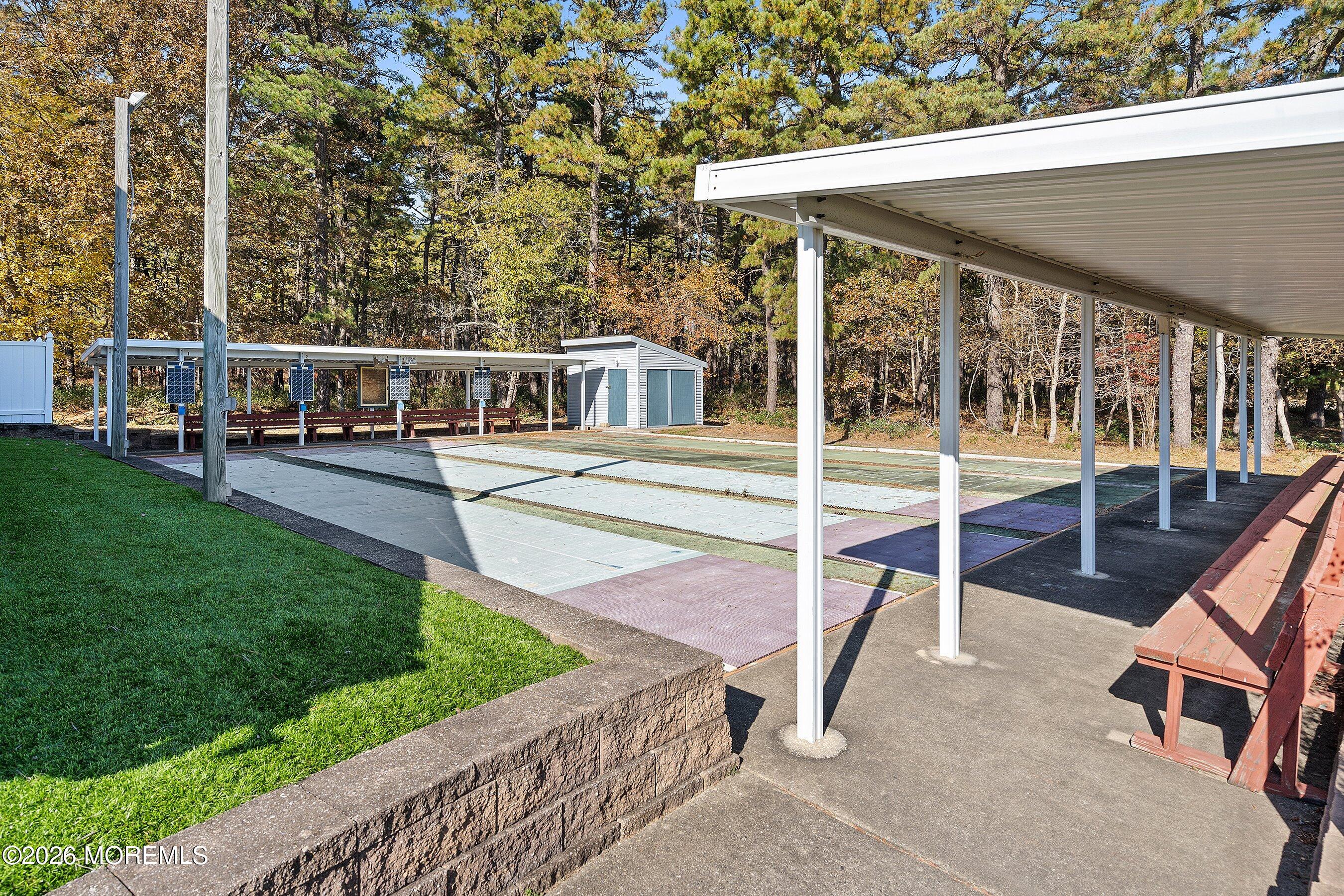 27 Amesbury Road, Unit 64 Whiting, NJ 08759 - Photo 47 of 50 a view of a house with backyard and porch