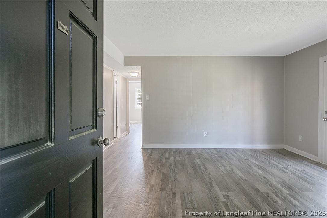 817 Ridge Road Fayetteville, NC 28311 - Photo 2 of 37 a view of hallway with wooden floor