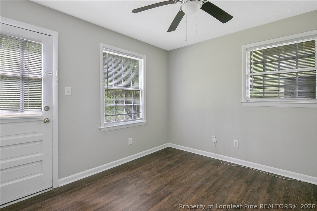 817 Ridge Road Fayetteville, NC 28311 - Photo 37 of 37 a view of an empty room with a window and wooden floor