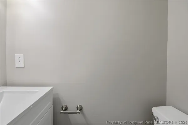 a bathroom with a sink and toilet