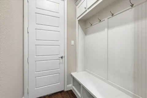 a bathroom with a shower and a sink