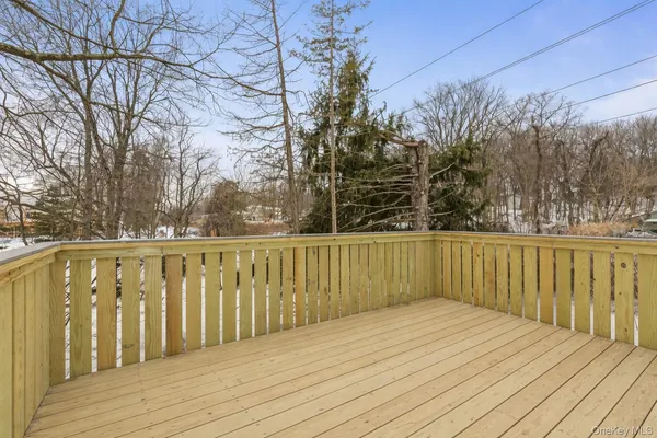 a view of balcony and wooden floor