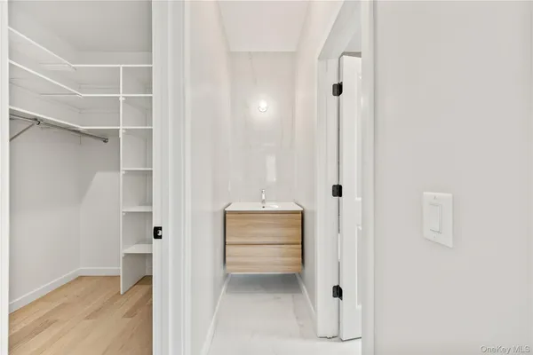 a view of a hallway with closet
