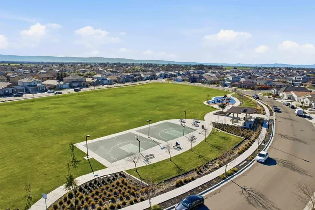 a view of a swimming pool with a lake view