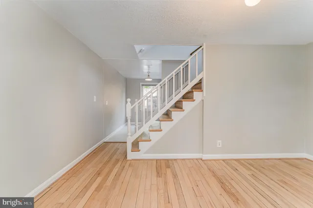a view of entryway with wooden floor