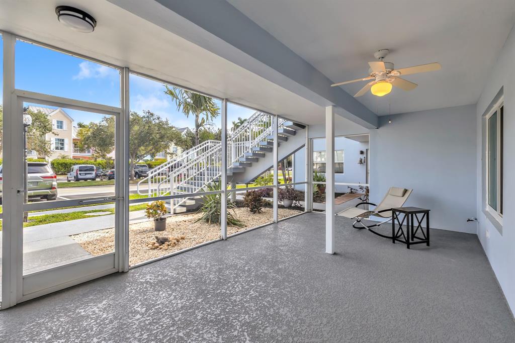 2835 Northeast 28th Avenue, Unit 3 Lighthouse Point, FL 33064 - Photo 7 of 30 a view of an empty room with a floor to ceiling window and a table