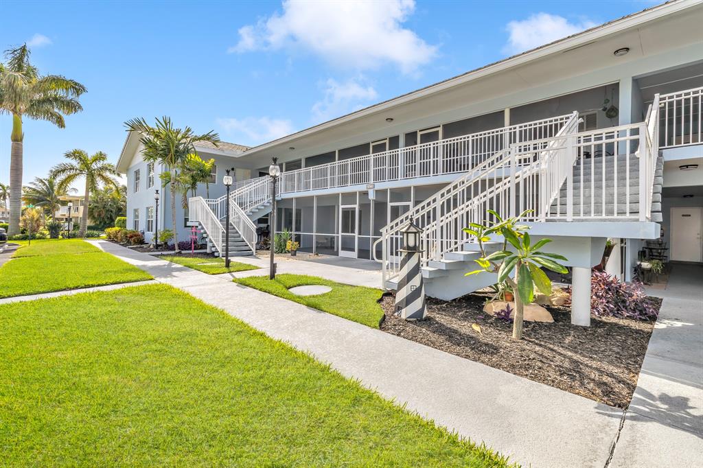 2835 Northeast 28th Avenue, Unit 3 Lighthouse Point, FL 33064 - Photo 10 of 30 a view of a house with swimming pool and sitting area