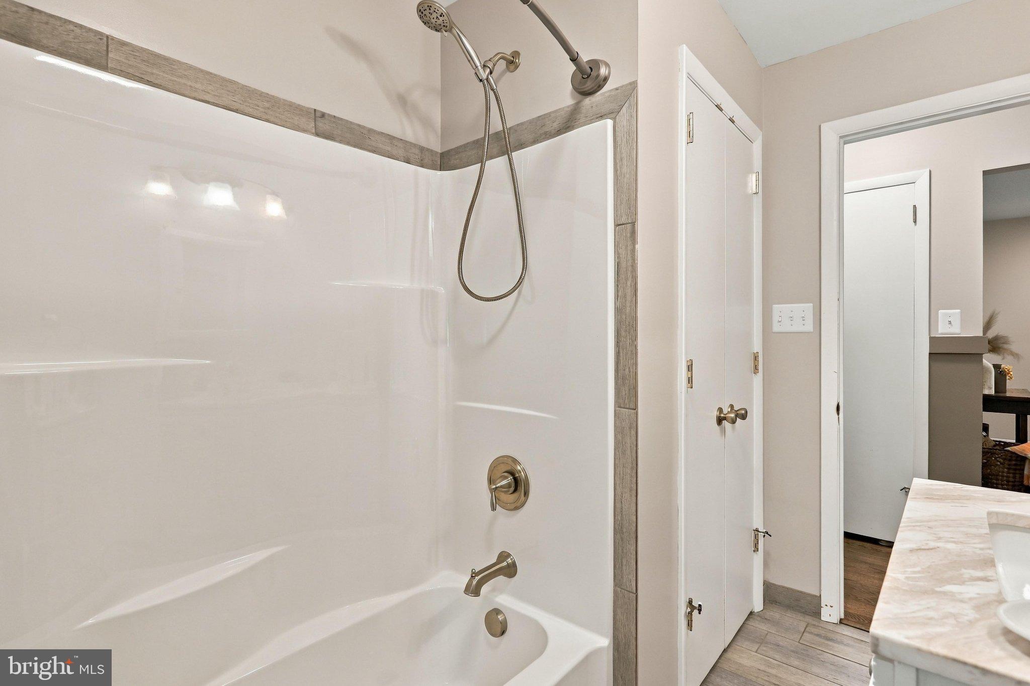 455 Mountain Road Front Royal, VA 22630 - Photo 34 of 62 Main level updated full bath with linen closet.