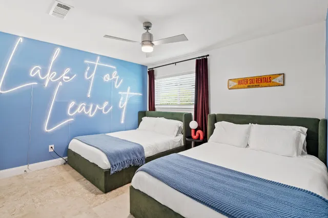 a bedroom with a bed and a couch