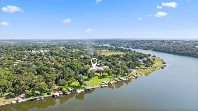 a view of a lake with a city