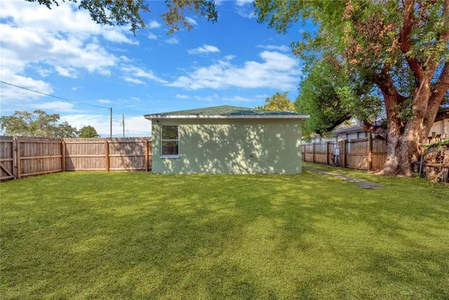 a view of a backyard with a garden