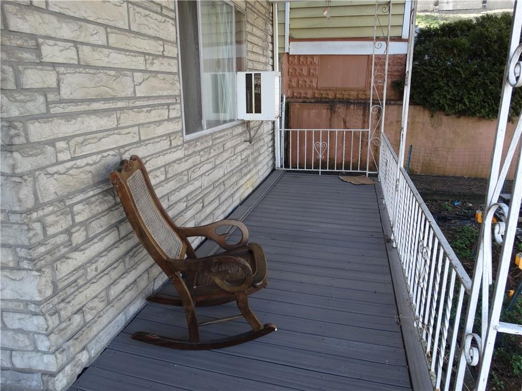 121 Cutler Street McKees Rocks, PA 15136 - Photo 4 of 17 a view of a balcony with chairs