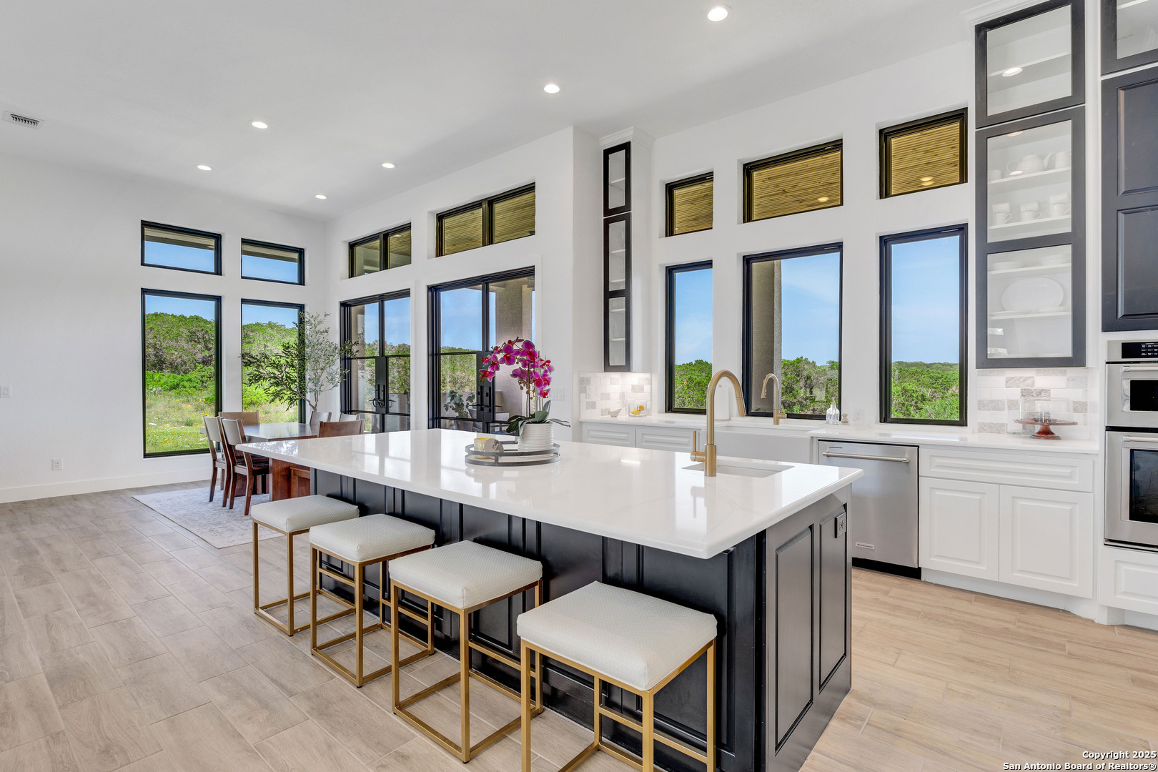 364 Private Road 2771 Mico, TX 78056 - Photo 1 of 1 a view of a dining room with furniture window and wooden floor