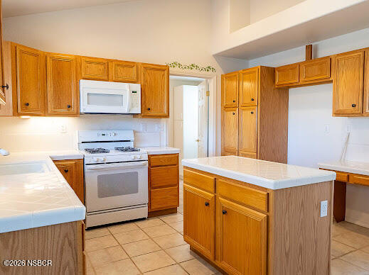 5011 Steeplegate Lane Santa Maria, CA 93455 - Photo 13 of 31 a kitchen with stainless steel appliances granite countertop a sink stove and refrigerator