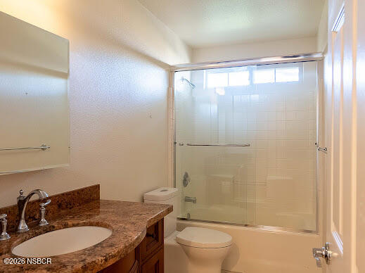 5011 Steeplegate Lane Santa Maria, CA 93455 - Photo 20 of 31 a bathroom with a granite countertop sink toilet and shower