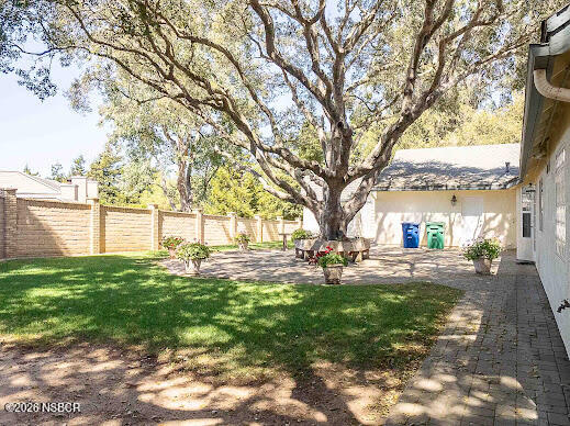 5011 Steeplegate Lane Santa Maria, CA 93455 - Photo 28 of 31 a view of yard with tree and wooden fence